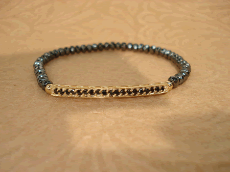# 2208 Hematite Stone with Skinny Gold Bar with Black Cubic Zirconia