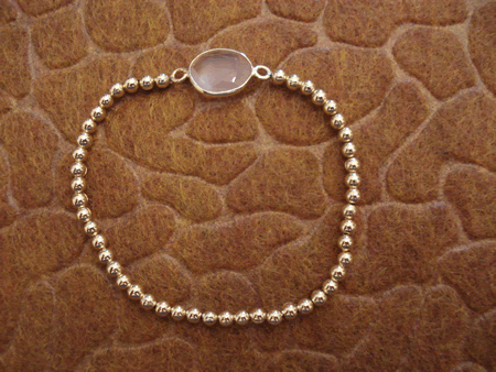 Model # 7701 3 mm gold Filled Beads with Semiprecious Moon Stone Flat Charm