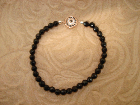 Model # 7806 Black Onyx with Round Rose gold Evil Eye