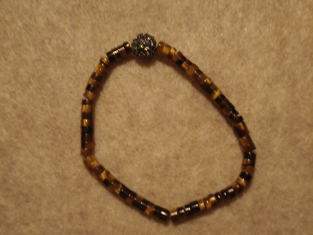 # 9010 8 mm Black Cubic Zirconia Pave Ball on Tiger Eye Beads
