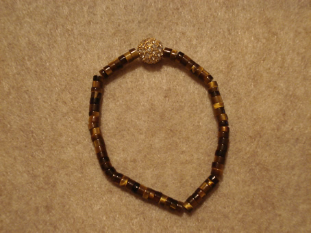 # 9013 10 mm Gold Cubic Zirconia Pave Ball on Tiger Eye Beads