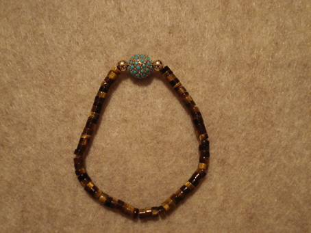 # 9014 10 mm Turquoise Pave Ball on Tiger Eye Beads