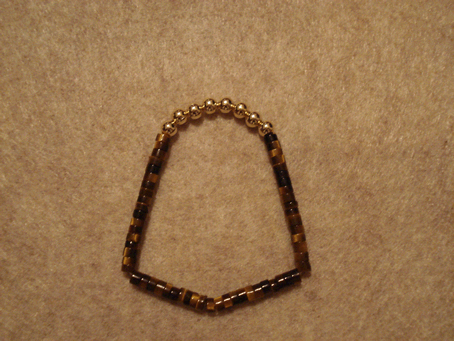 # 9017 Tiger Eye Beads with 5 mm GoldFilled Top