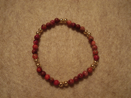 # 9035 Semiprecious Multicolored Jade Stone with 2 and 2 4 mm Gold Filled Beads